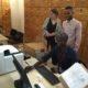 Project staff practice the workflow to prepare a box of court records for scanning.